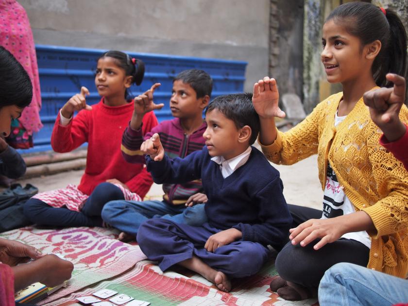 /media/smgas/Deaf Child Worldwide image children learning Indian Sign Language together at Child in Need Institute.jpg